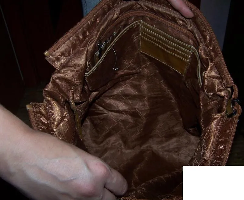 Удобная, большая кожаная (натур.) сумка